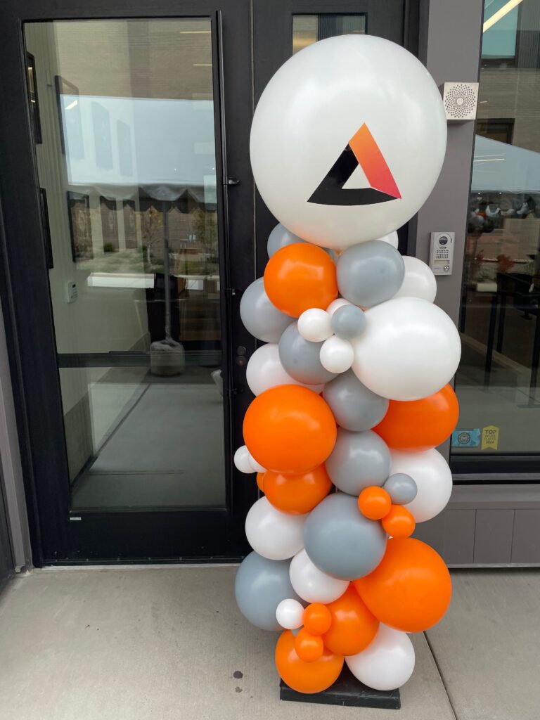 Branded balloon column with Axle Logistics logo for Knoxville