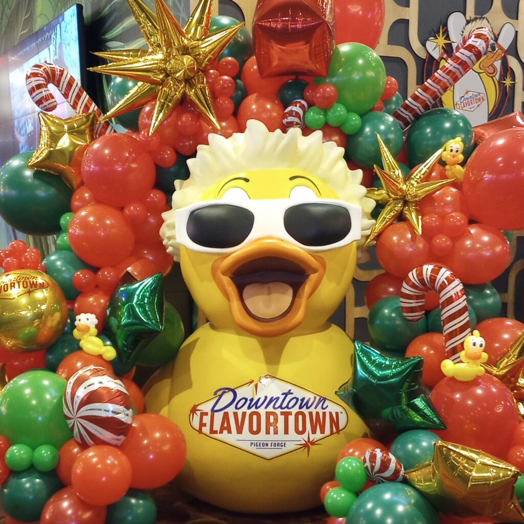 Branded holiday balloon installation for a corporate partner in Pigeon Forge Tennessee
