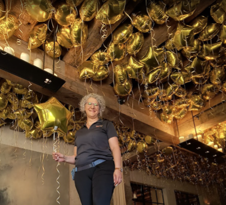 Elevated balloon installation adding color and dimension to a Knoxville event